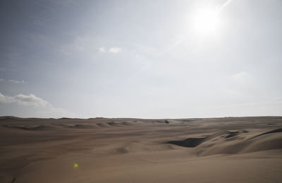 Scenic view of desert against sky