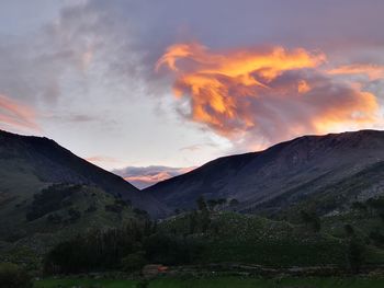 Scenic view of mountains against sky during sunset