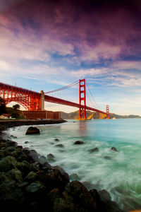 View of suspension bridge over sea