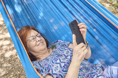 Young woman using mobile phone