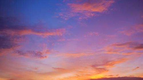 Low angle view of dramatic sky during sunset