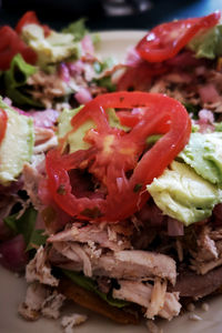 Close-up of chopped fruits in plate