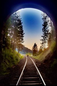 Railroad tracks in tunnel