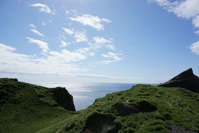 Scenic view of landscape against blue sky