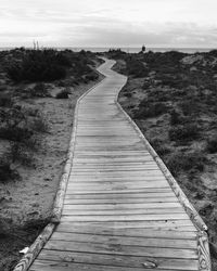 Road amidst landscape against sky