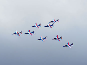 Military aircraft flying patrol in the sky