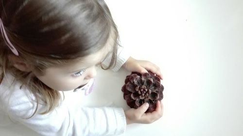 Close-up of girl holding ice cream