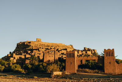 Low angle view of old ruins against clear sky