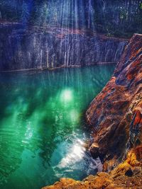 Reflection of rock formation in lake