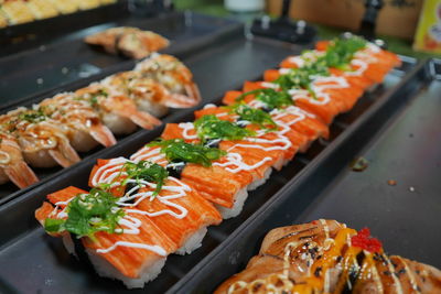 Close-up of sushi on tray