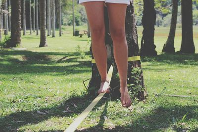 Woman balancing on slackline