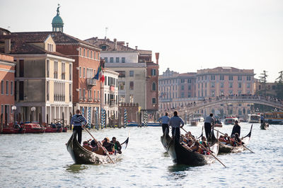 Gondolas with tourists in venice