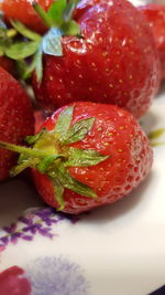 High angle view of strawberries in plate