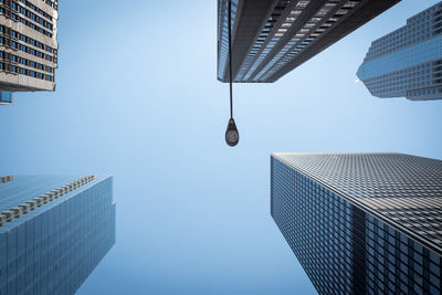 Low angle view of buildings against clear sky