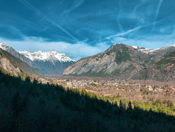 Scenic view of snowcapped mountains against sky