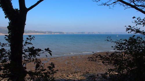 Scenic view of sea against clear sky