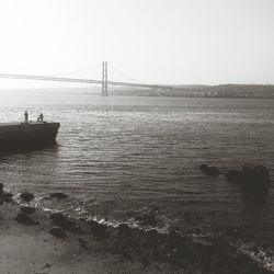 Suspension bridge over river