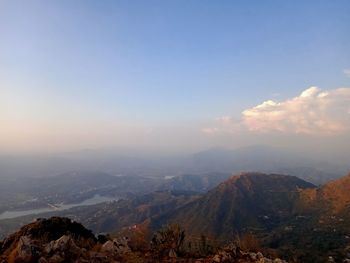 Scenic view of mountains against sky during sunset