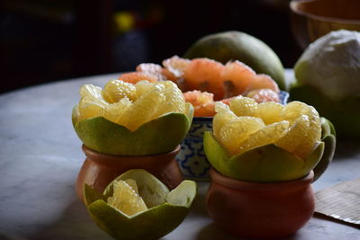 Close-up of fruits in plate on table