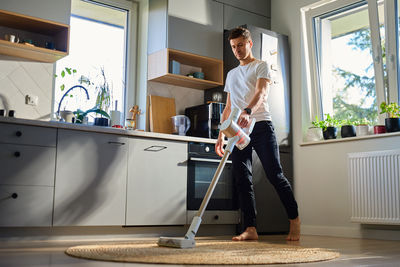 Side view of man working at home
