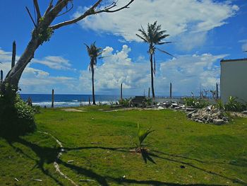 Scenic view of sea against cloudy sky