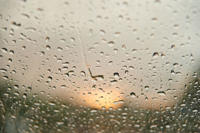 Full frame shot of wet glass during monsoon