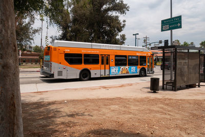 View of bus stop sign on road