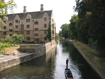 Boats moored in canal