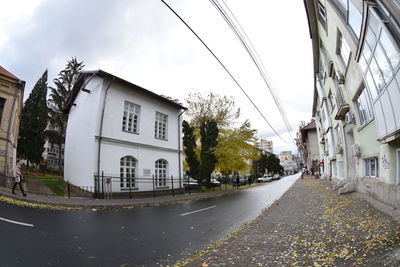 Road leading towards buildings