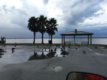 Scenic view of sea against cloudy sky