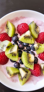 Close-up of fruits in plate