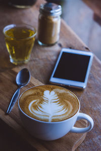 Coffee cup on table