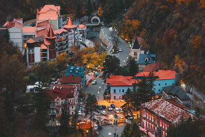 High angle view of illuminated buildings in city