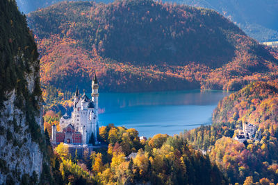 Scenic view of lake by trees during autumn