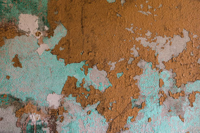 Abstract wall background, various old oil paints on the wall, beautiful texture