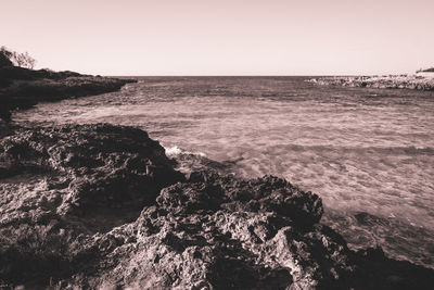 Scenic view of sea against clear sky