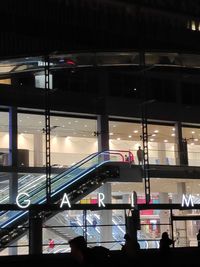 Illuminated lights in airport at night