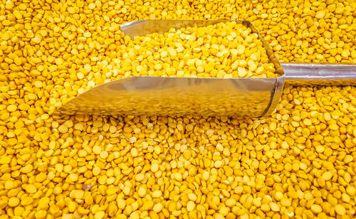 Full frame shot of yellow corn starch for sale in market