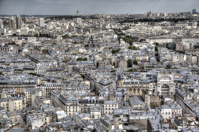 High angle view of cityscape seen through eiffel tower