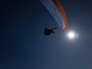 Low angle view of kite flying in sky