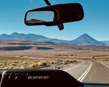 Road seen through car windshield