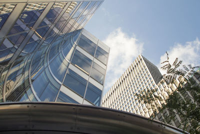 Low angle view of modern buildings against sky