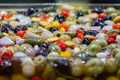 Close-up of  pickles on salve in a market