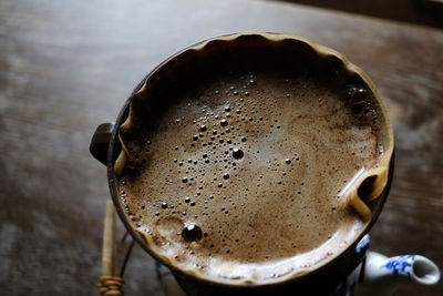 Close-up of cappuccino on table