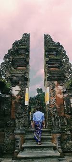 Low angle view of statue against sky