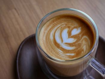 High angle view of cappuccino on table