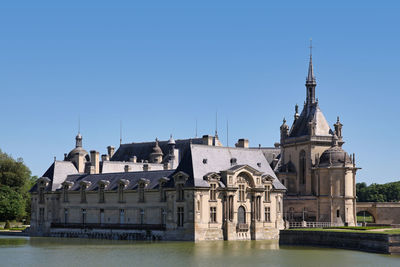 Chantilly, france - may 26 2012 - château de chantilly in the department of oise in hauts-de-france.