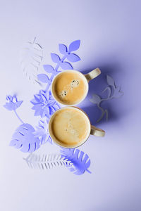 High angle view of coffee on table against white background