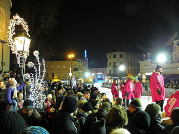 Group of people at market stall