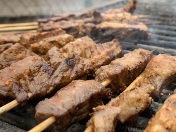 Close-up of meat on barbecue grill